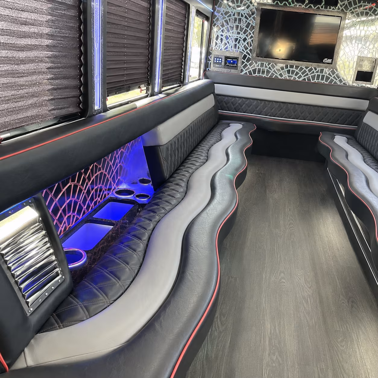 Wedding guests seated inside a party bus serving Bellevue